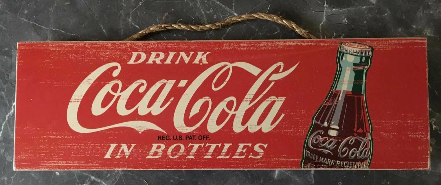 Drink Coca-Cola in Bottles 